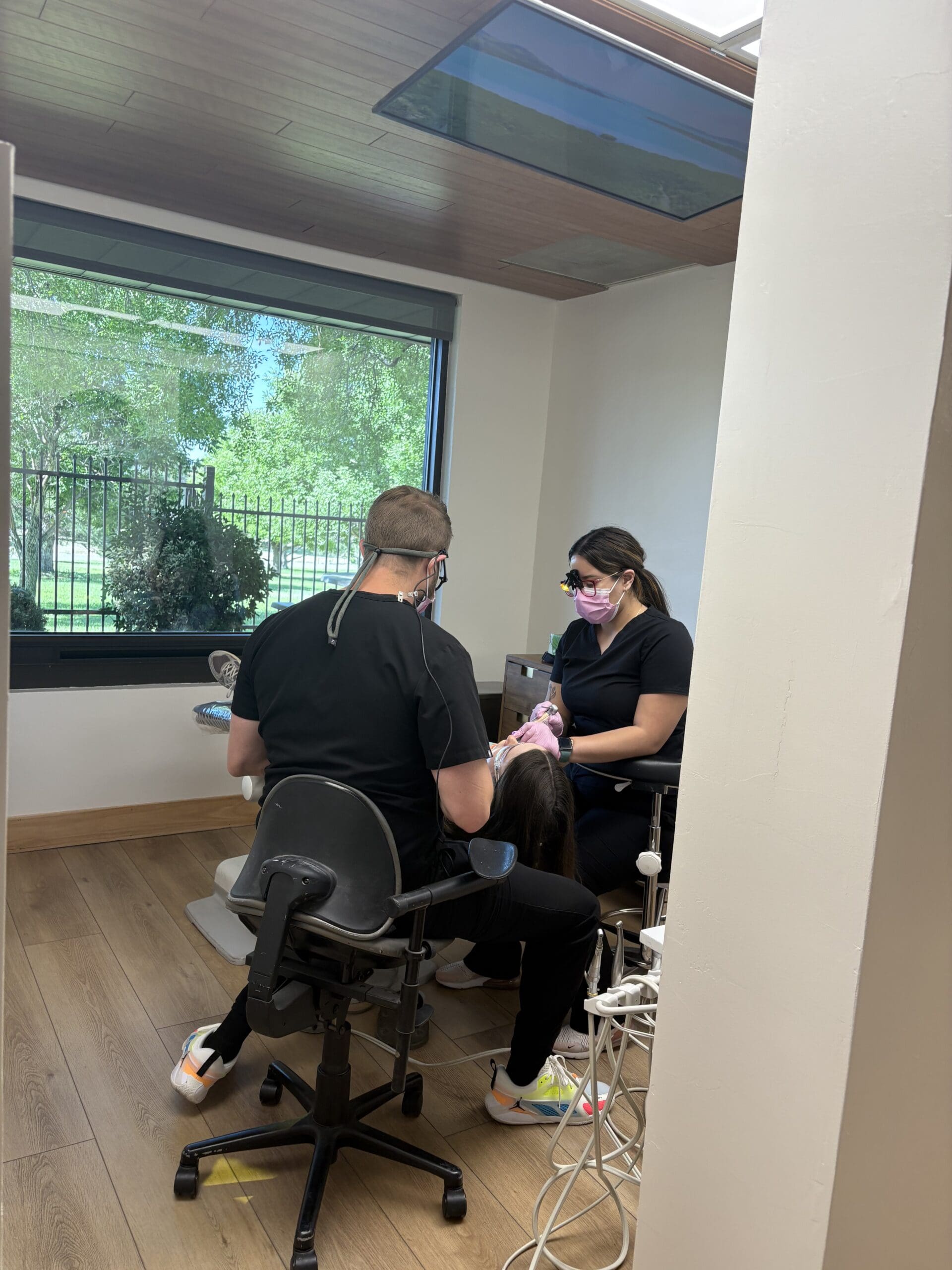 A patient receiving dental implants in Albuquerque with Maven Dentistry