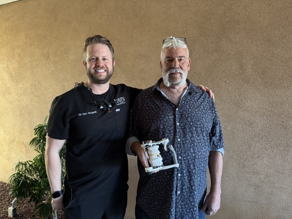 Dr. Stogsdill smiling with John who makes crowns locally in Albuquerque