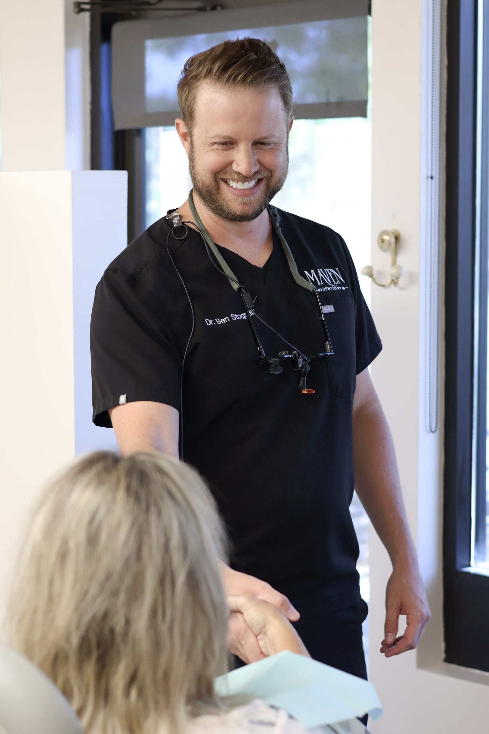 Dr. Stogsdill caring for a patient at Maven Dentistry.